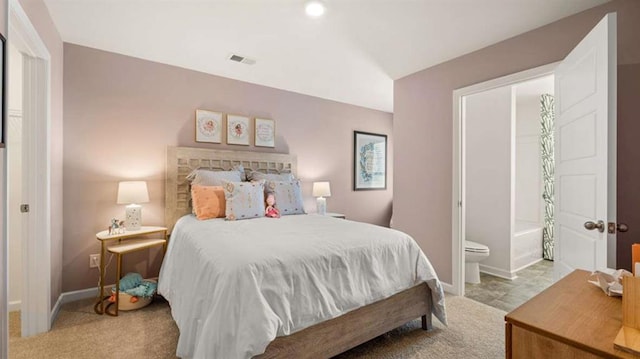 carpeted bedroom featuring visible vents and baseboards