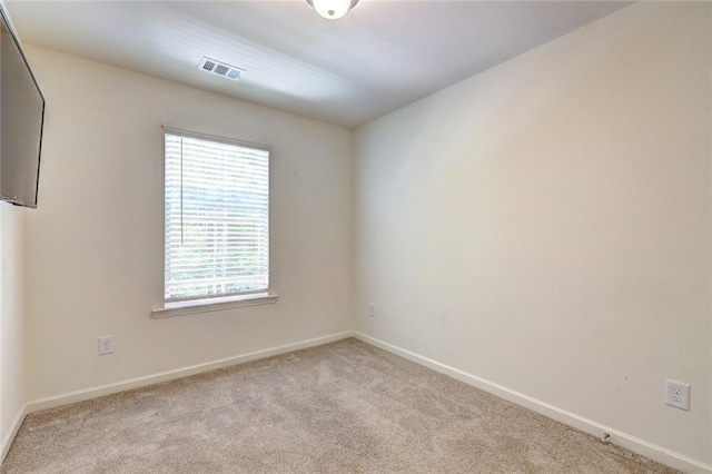 1005 Belfry Ter, Fairburn, GA 30213 - carpeted spare room featuring baseboards