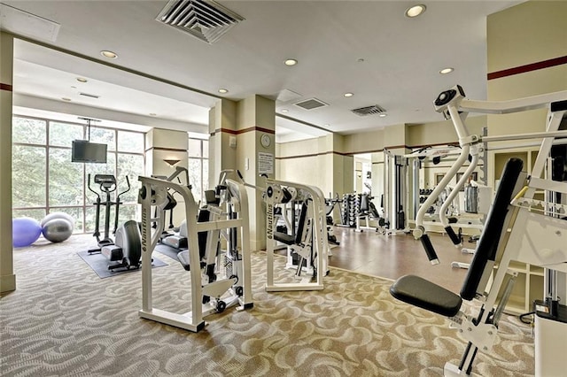 gym with carpet flooring, visible vents, and recessed lighting