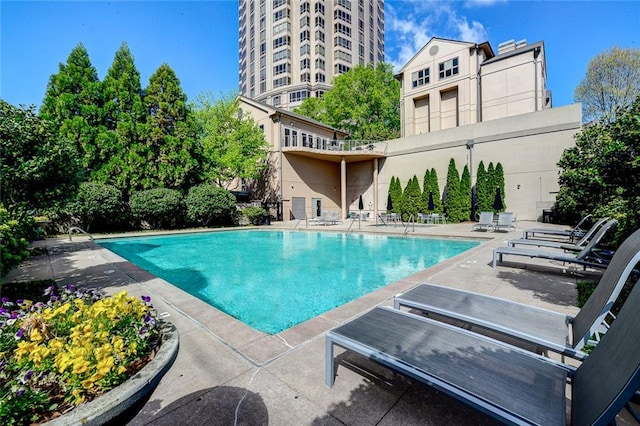 pool featuring a patio area