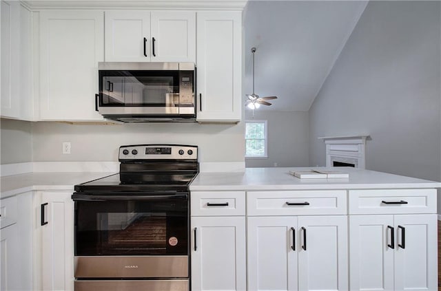 17 Fawn Ridge Dr SW, Cartersville, GA 30120 - kitchen with appliances with stainless steel finishes, a peninsula, light countertops, white cabinetry, and a ceiling fan