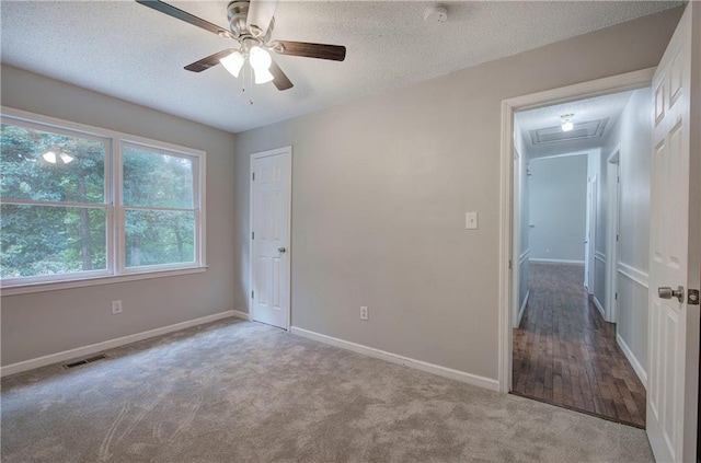 17 Fawn Ridge Dr SW, Cartersville, GA 30120 - unfurnished bedroom featuring carpet flooring, a textured ceiling, and ceiling fan