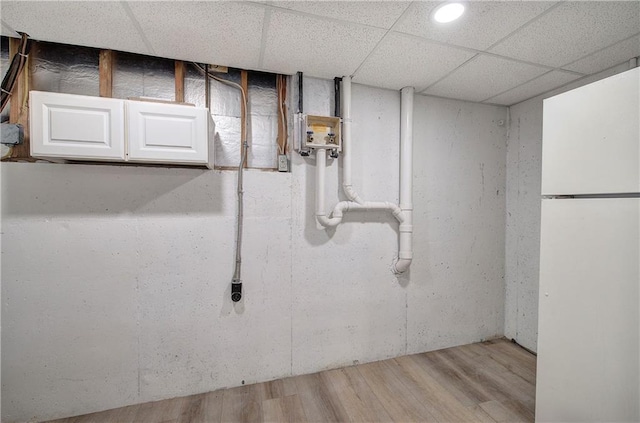 17 Fawn Ridge Dr SW, Cartersville, GA 30120 - unfinished below grade area with freestanding refrigerator, wood finished floors, and recessed lighting
