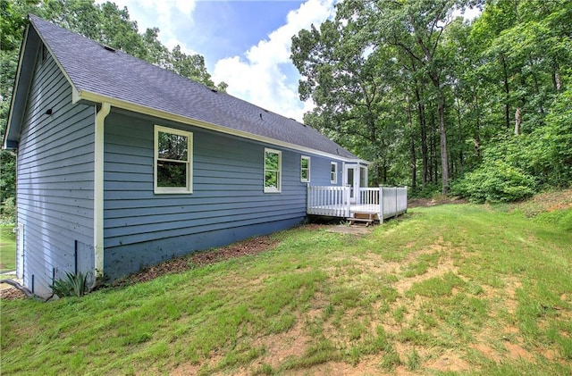 17 Fawn Ridge Dr SW, Cartersville, GA 30120 - rear view of house with a wooden deck, a yard, and roof with shingles