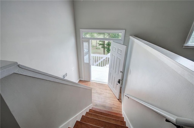 17 Fawn Ridge Dr SW, Cartersville, GA 30120 - staircase featuring wood finished floors and healthy amount of natural light