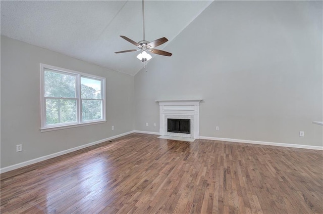 17 Fawn Ridge Dr SW, Cartersville, GA 30120 - unfurnished living room featuring ceiling fan, wood finished floors, a premium fireplace, and high vaulted ceiling