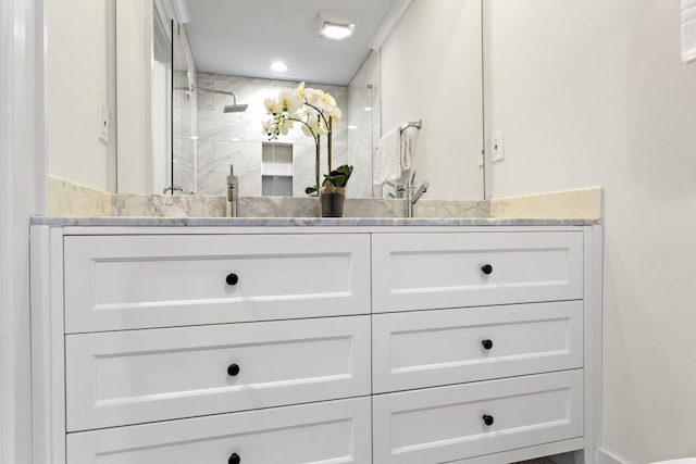 4178 Castle Pines Ct, Tucker, GA 30084 - bathroom featuring double vanity and tiled shower
