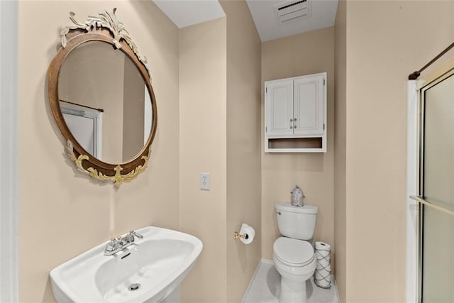 1374 Riverside Dr, Gainesville, GA 30501 - bathroom featuring a sink, toilet, baseboards, and tile patterned floors