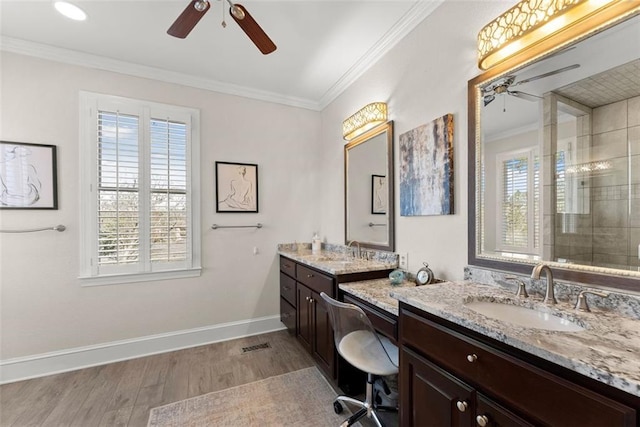 1374 Riverside Dr, Gainesville, GA 30501 - full bathroom with a ceiling fan, wood finished floors, ornamental molding, baseboards, and two vanities