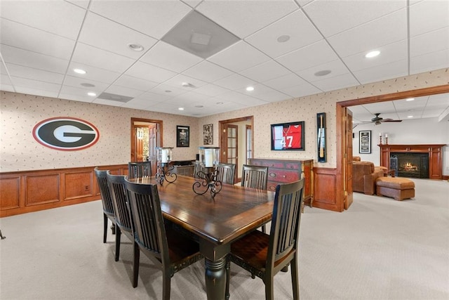 1374 Riverside Dr, Gainesville, GA 30501 - dining room with wallpapered walls, light carpet, a wainscoted wall, ceiling fan, and a drop ceiling