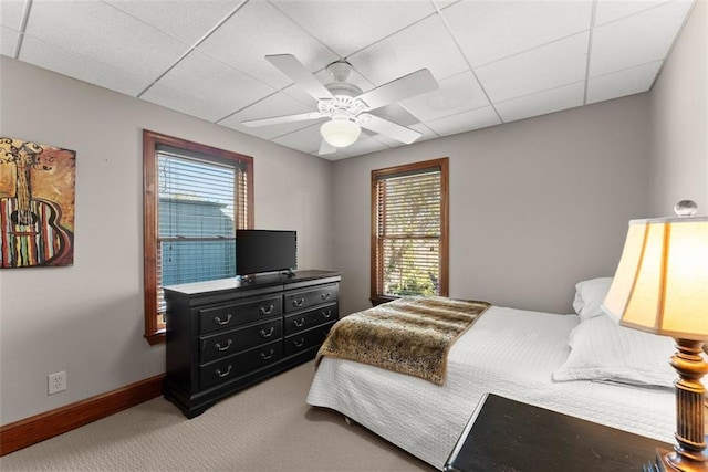 1374 Riverside Dr, Gainesville, GA 30501 - carpeted bedroom featuring multiple windows, a drop ceiling, baseboards, and ceiling fan