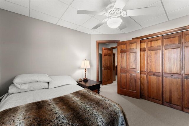 1374 Riverside Dr, Gainesville, GA 30501 - bedroom featuring light colored carpet, a drop ceiling, and a ceiling fan