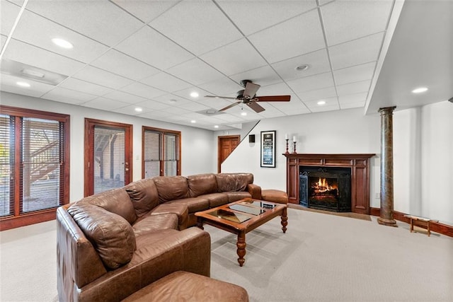 1374 Riverside Dr, Gainesville, GA 30501 - living room with carpet floors, a fireplace with flush hearth, a ceiling fan, decorative columns, and recessed lighting