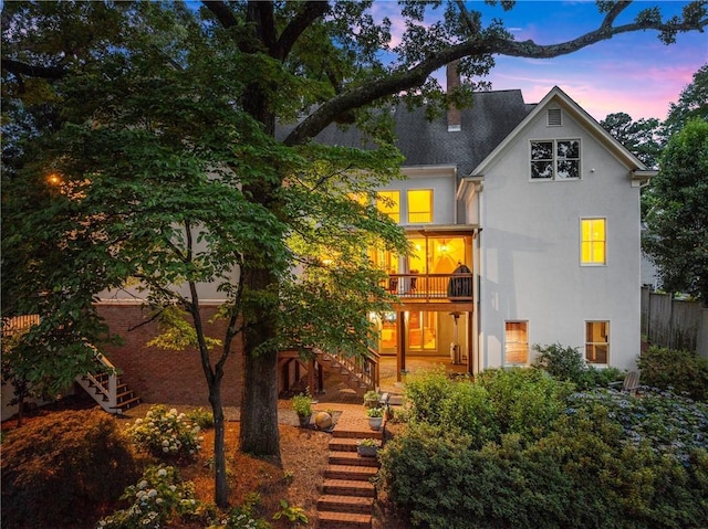 1374 Riverside Dr, Gainesville, GA 30501 - view of front of home featuring stairs, stucco siding, and a balcony