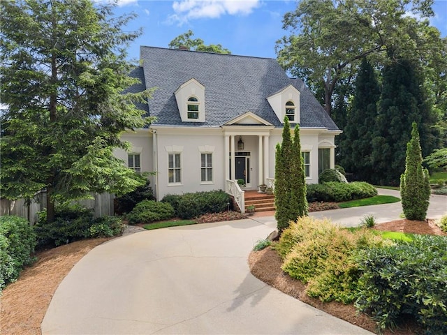 1374 Riverside Dr, Gainesville, GA 30501 - french country style house with stucco siding, roof with shingles, and a porch