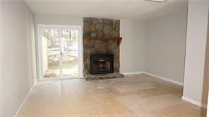 unfurnished living room with a fireplace