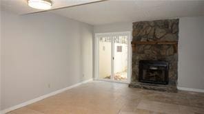 unfurnished living room featuring a fireplace