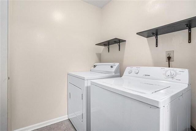 washroom featuring independent washer and dryer