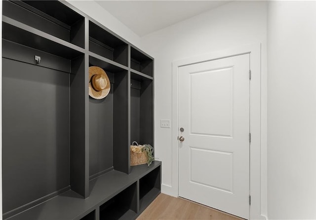 mudroom with light wood finished floors