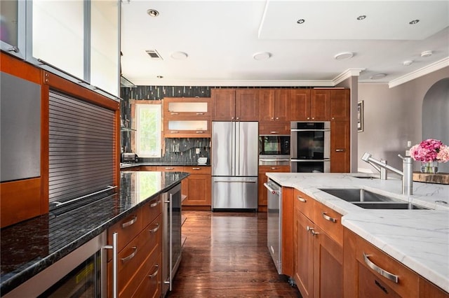 1216 E Rock Springs Rd NE, Atlanta, GA 30306 - kitchen with stainless steel appliances, a sink, ornamental molding, wine cooler, and decorative backsplash