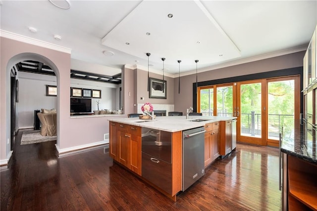 1216 E Rock Springs Rd NE, Atlanta, GA 30306 - kitchen with stainless steel dishwasher, brown cabinets, a sink, a kitchen island with sink, and dark wood finished floors