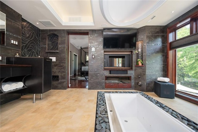 1216 E Rock Springs Rd NE, Atlanta, GA 30306 - bathroom with a tub with jets and a tray ceiling