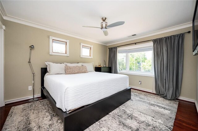1216 E Rock Springs Rd NE, Atlanta, GA 30306 - bedroom with ornamental molding, baseboards, dark wood-type flooring, and a ceiling fan