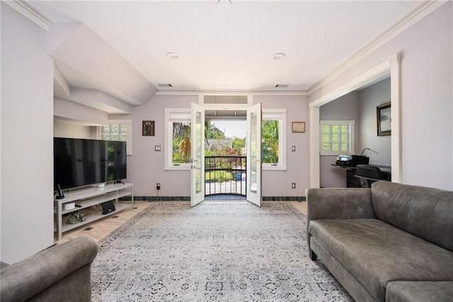 1216 E Rock Springs Rd NE, Atlanta, GA 30306 - living area with baseboards, crown molding, and healthy amount of natural light