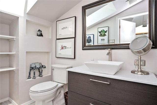 1216 E Rock Springs Rd NE, Atlanta, GA 30306 - half bath with toilet, lofted ceiling, and vanity
