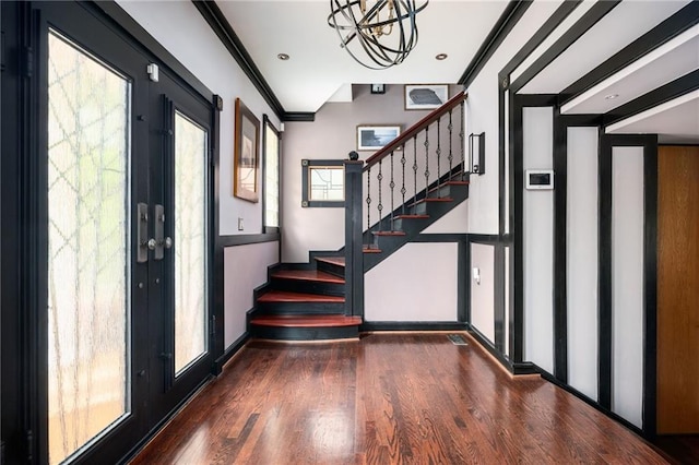 1216 E Rock Springs Rd NE, Atlanta, GA 30306 - entryway with stairway, wood finished floors, a chandelier, elevator, and crown molding