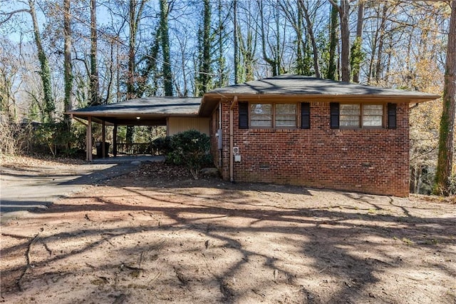 view of front of house featuring a carport