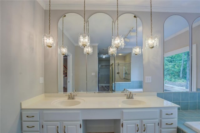 13935 Brown Bridge Rd, Covington, GA 30016 - full bathroom featuring crown molding, double vanity, a stall shower, and a bath