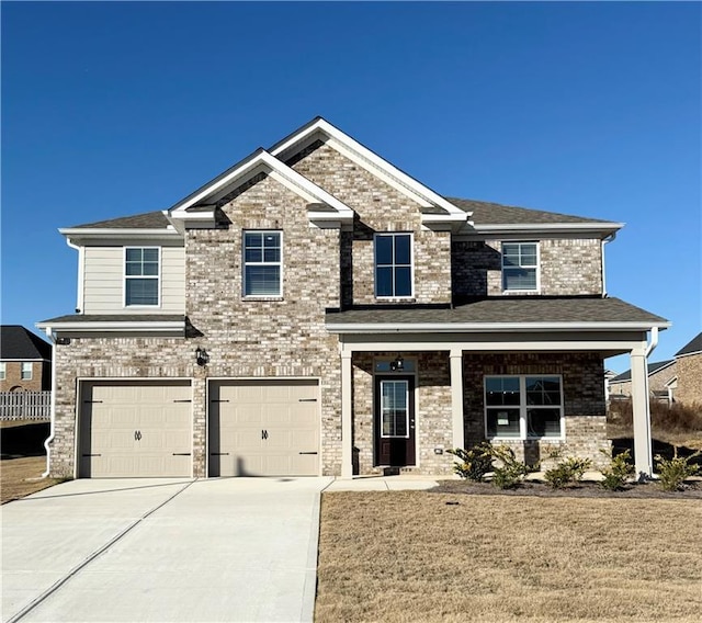 craftsman-style home with a porch and a garage