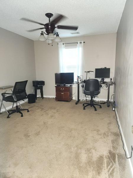 5449 Festival Ave, Fairburn, GA 30213 - office space featuring carpet floors, baseboards, ceiling fan, and a textured ceiling