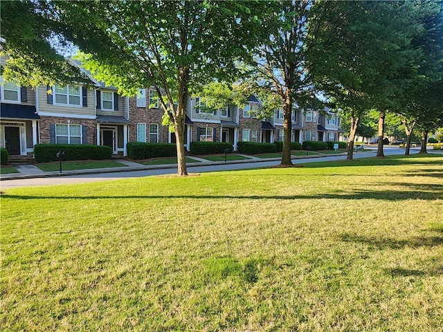 5449 Festival Ave, Fairburn, GA 30213 - view of home's community featuring a residential view and a yard