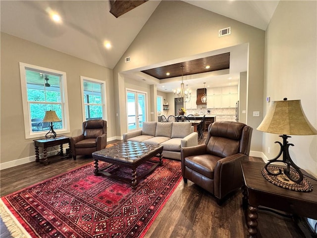 112 Three Oaks Dr SE, Calhoun, GA 30701 - living area featuring dark wood finished floors, vaulted ceiling, recessed lighting, and a chandelier