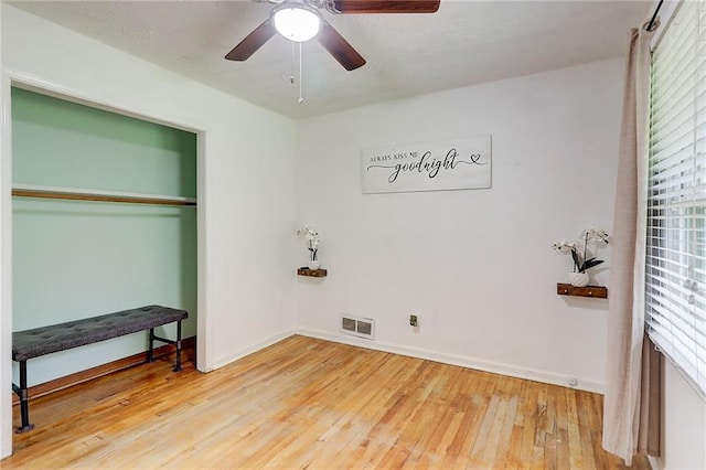 122 Vickery Dr, Fairburn, GA 30213 - unfurnished bedroom featuring hardwood / wood-style flooring, baseboards, a closet, and ceiling fan
