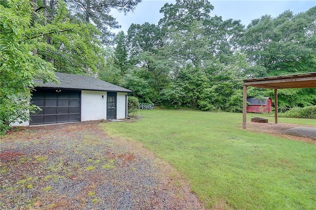 122 Vickery Dr, Fairburn, GA 30213 - view of green lawn featuring a garage