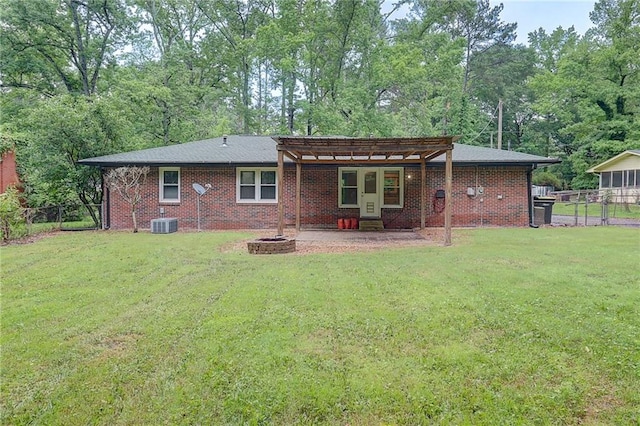 122 Vickery Dr, Fairburn, GA 30213 - rear view of house featuring a pergola, central AC, brick siding, a fire pit, and a patio area