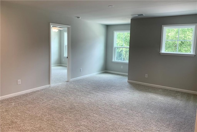 7206 Grand Reunion Dr, Hoschton, GA 30548 - empty room featuring carpet floors and a ceiling fan