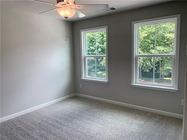 7206 Grand Reunion Dr, Hoschton, GA 30548 - spare room with carpet floors and ceiling fan