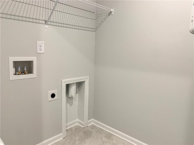7206 Grand Reunion Dr, Hoschton, GA 30548 - laundry room featuring hookup for an electric dryer and hookup for a washing machine