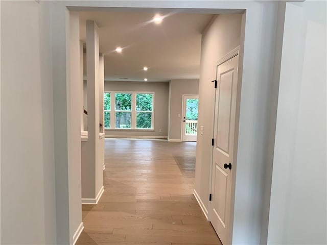 7206 Grand Reunion Dr, Hoschton, GA 30548 - hallway featuring light wood-type flooring and recessed lighting