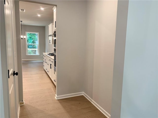 7206 Grand Reunion Dr, Hoschton, GA 30548 - hall with light wood finished floors