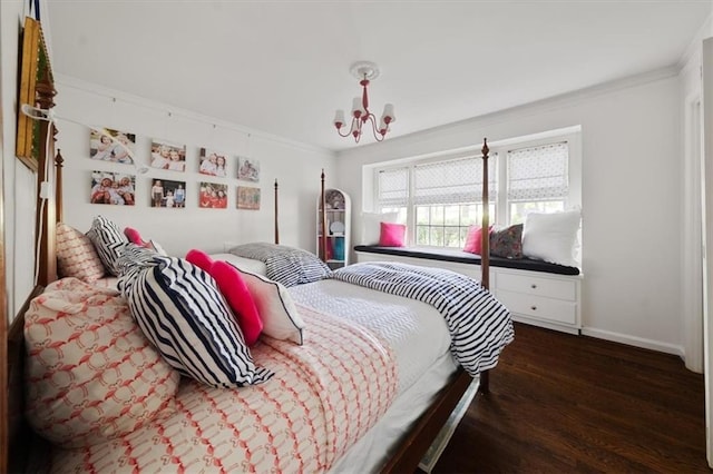 302 Chinquapin Dr SW, Marietta, GA 30064 - bedroom featuring wood finished floors, ornamental molding, a chandelier, and baseboards