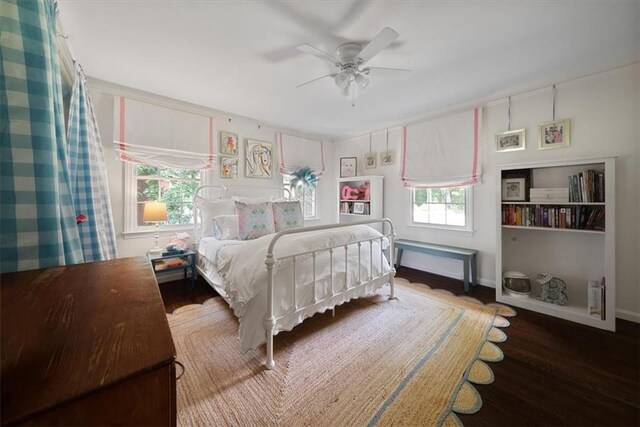 302 Chinquapin Dr SW, Marietta, GA 30064 - bedroom with wood finished floors, ceiling fan, and baseboards
