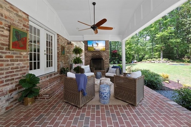 302 Chinquapin Dr SW, Marietta, GA 30064 - view of patio / terrace with french doors, a ceiling fan, and an outdoor living space with a fireplace