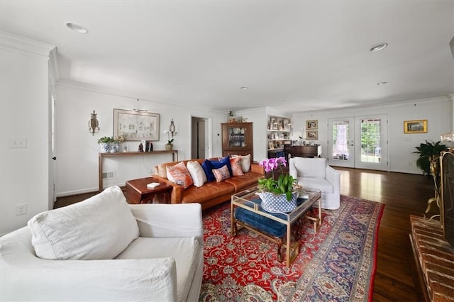 302 Chinquapin Dr SW, Marietta, GA 30064 - living area with ornamental molding, wood finished floors, french doors, and recessed lighting