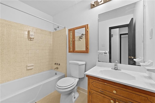 full bath featuring toilet, tile patterned floors, shower / washtub combination, and vanity