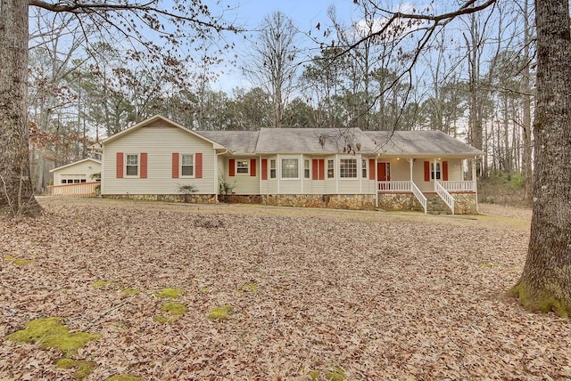 ranch-style house featuring a porch